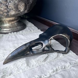 Black and bronze raven skull decor